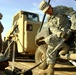 Army Soldiers Secure Equipment for Transport in Iraq