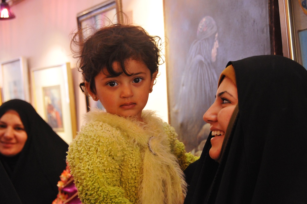Iraqi Mother and Daughter Celebrate International Women's Day at Art Show