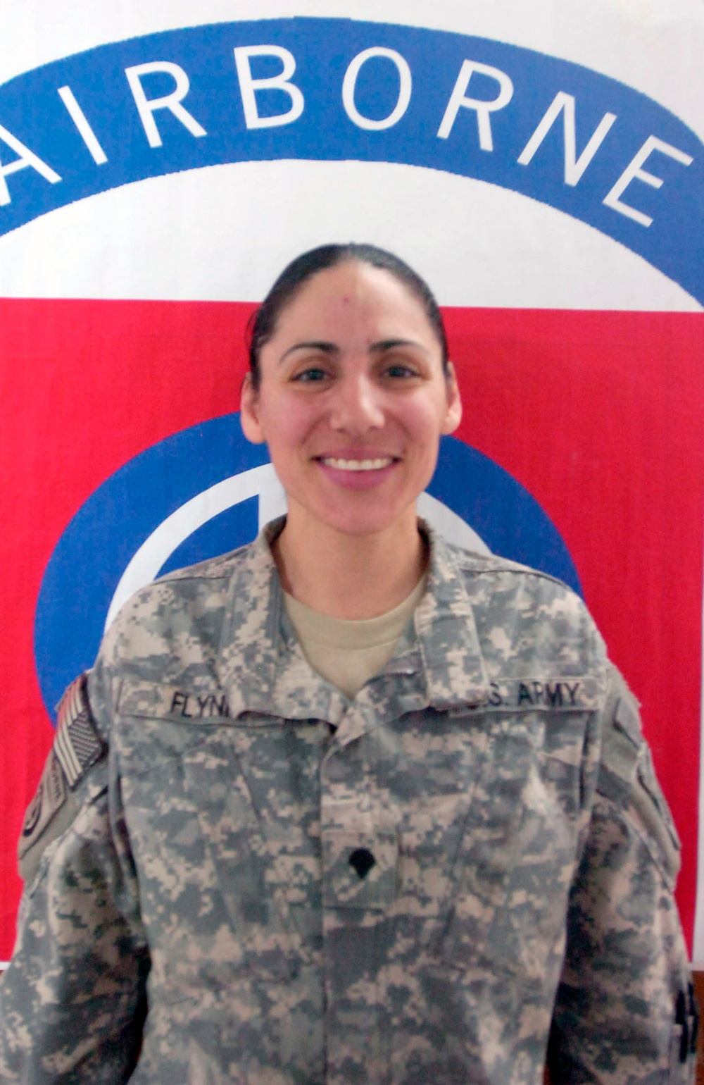 Army Spc. Eileen Flynn Follows Husband's Military Path