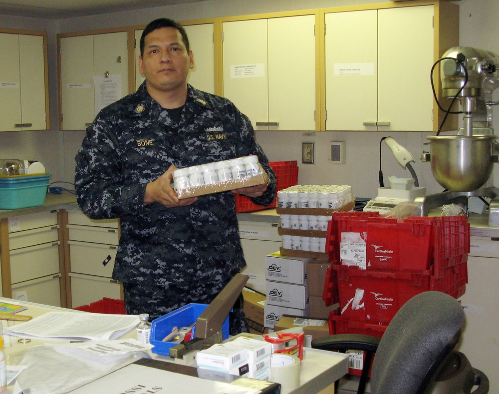 USNS Comfort Pharmacy Technician Prepares for Continuing Promise 2009 Mission