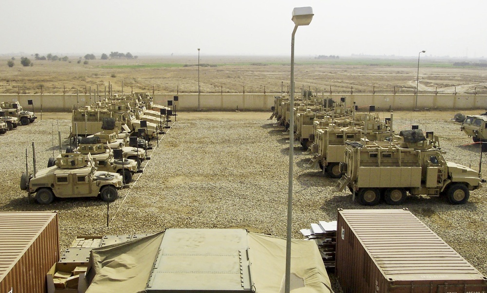 U.S. Army Vehicles Await Deployment at Iraqi Combat Outpost