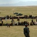 Afghan Police Officer Provides Security During Traditional Game Tournament