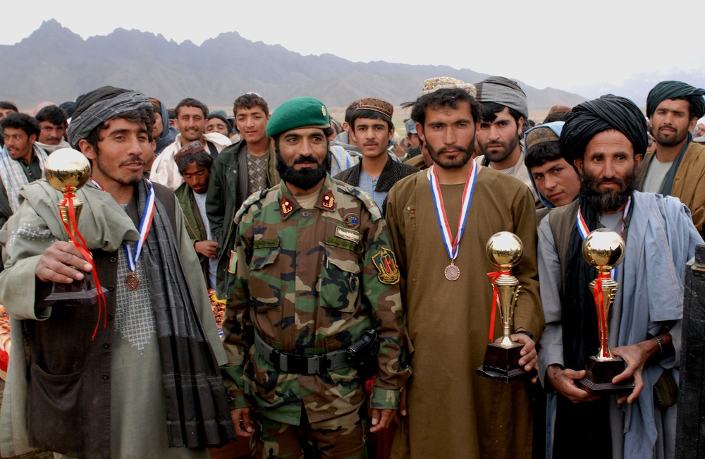 District Chief Poses with Goodwill Games Winners in Afghanistan