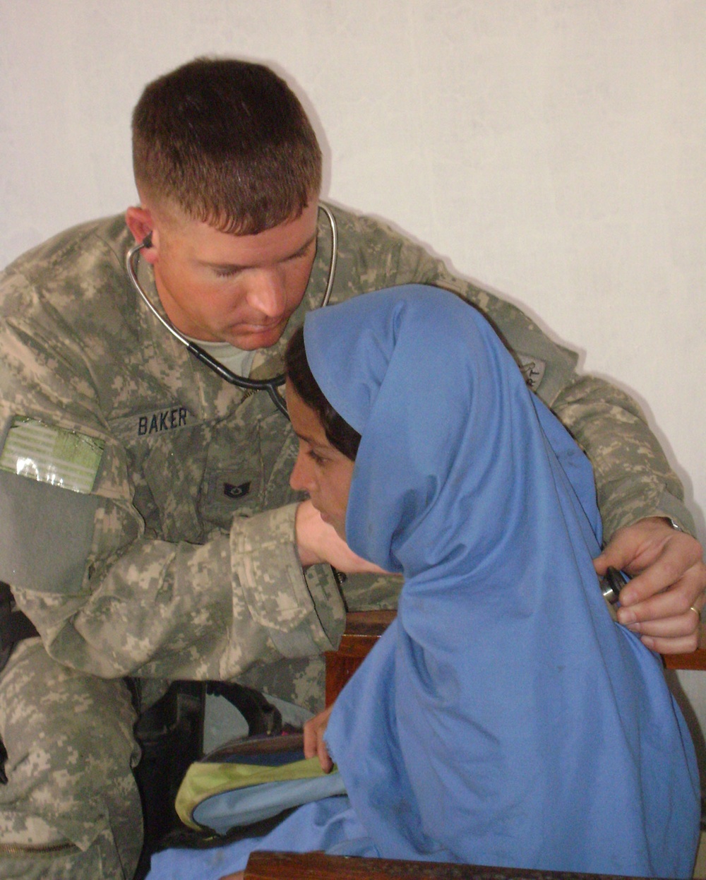 Air Force Medic Provides Care to Afghan Student at Clinic