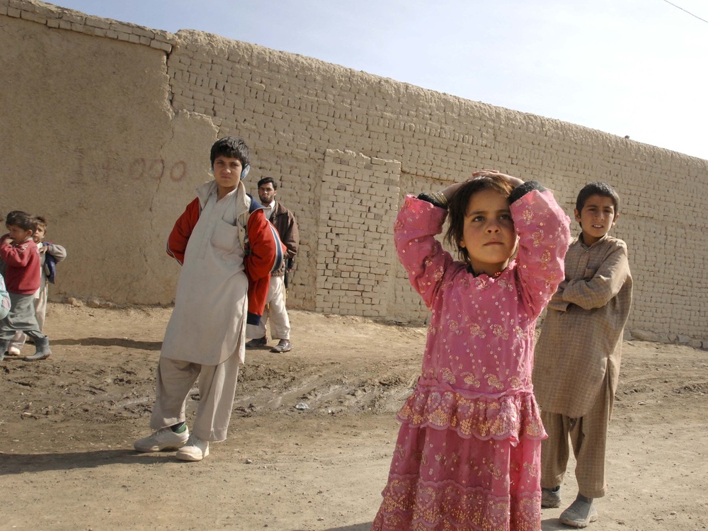 Afghan Children Greet U.S. Military Convoy in Paktia Province