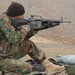 Afghan Soldier Trains with M-16 Rifle at Forward Operating Base