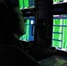 Submarine Sonar Operator Monitors Systems During Drill