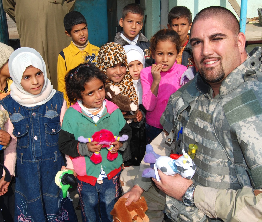 Army Corps of Engineers Employees Distribute Toys to Iraqi Children