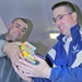 U.S. Troops Load Supplies for Humanitarian Mission in Afghanistan