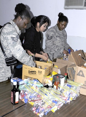 Air Force Airmen Assemble Humanitarian Aid Packages for Afghans