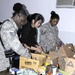 Air Force Airmen Assemble Humanitarian Aid Packages for Afghans