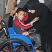 Child Receives New Wheelchair at Babil Rehabilitation Center in Iraq