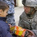 U.S. Army Officer Distributes School Supplies to Iraqi Children