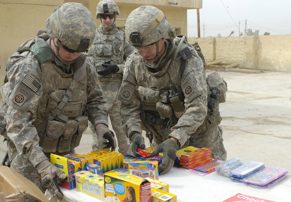 U.S. Soldiers Distribute School Supplies to Iraqi Students