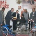 Babil Resident Receives Wheelchair Instruction from Provincial Reconstruction Team Leader