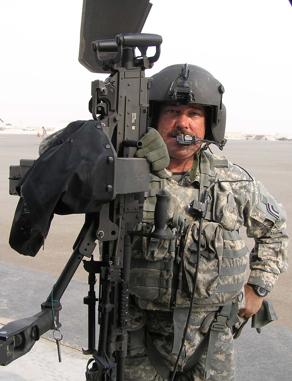 Army Staff Sgt. Performs Pre-Flight Checks on Black Hawk in Iraq