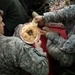 U.S. Army Captains Share Afghan Meal During Provincial Reconstruction Meeting