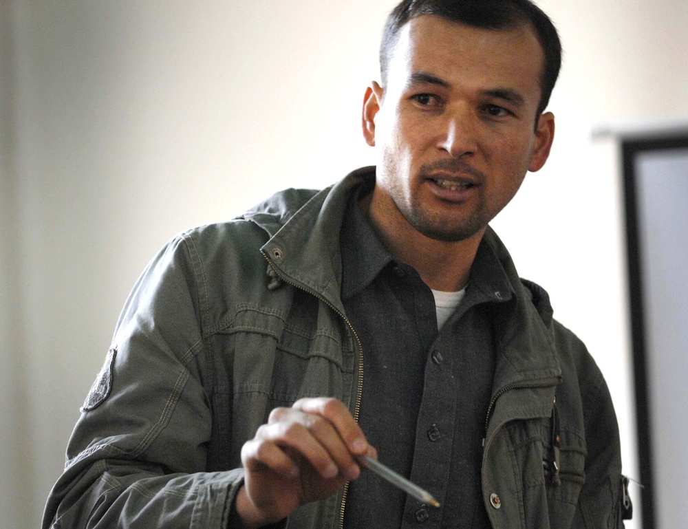 Afghan Engineer Discusses Contract Requirements at Reconstruction Conference