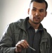 Afghan Engineer Discusses Contract Requirements at Reconstruction Conference