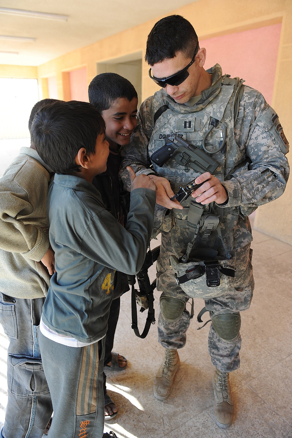 U.S. Soldiers Distribute Blankets to Iraqi Children in Baghdad