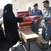 Iraqi General Distributes Blankets to Residents in Baghdad
