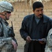 Army Officer Discusses School Renovation Plans with Headmaster