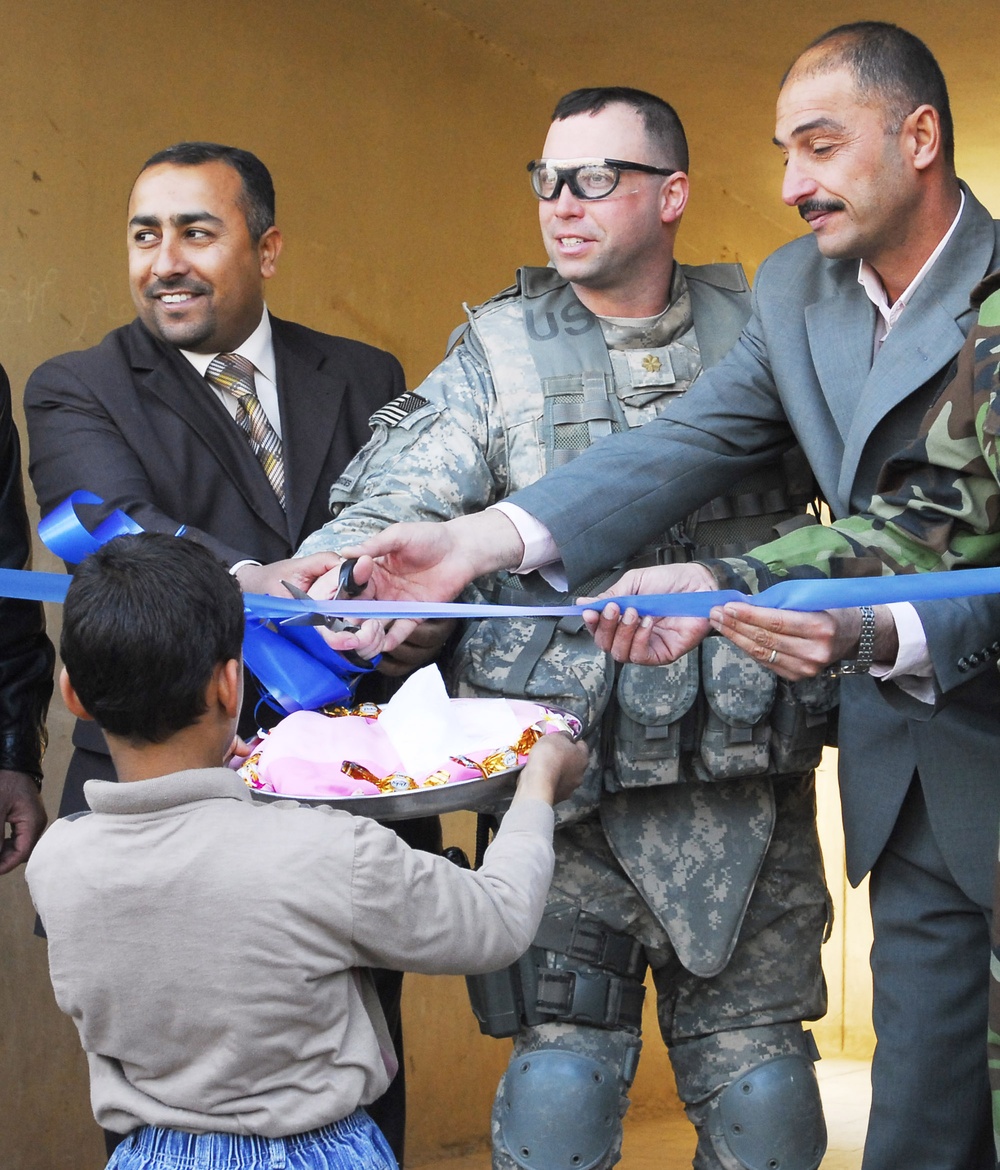 U.S. Army Major Helps Open New High School in Baghdad Suburb