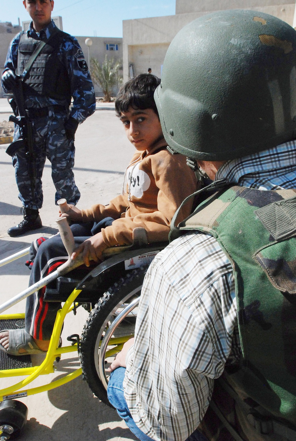 Iraqi Boy Tries Out New Wheelchair Donated by Nonprofit
