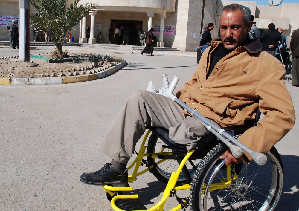 Iraqi Army Sergeant Receives Wheelchair in Sadr City