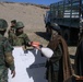 Afghan Soldier Provides Aid to Villager in Oruzgan Province