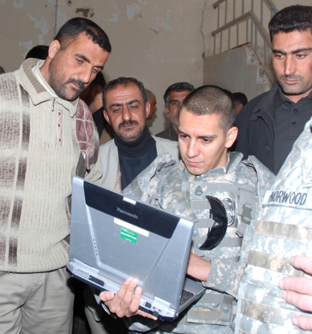 Army Instructor Trains Iraqi Technicians on Logbook Documentation