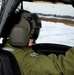 Canadian Air Force Pilot Performs Preflight Checks on NY National Guard Chinook