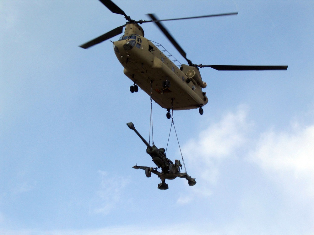 Chinook Airlifts Howitzer to Forward Operating Base in Afghanistan