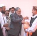 Afghan Governor Administers Polio Vaccine to Young Girl
