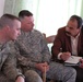 U.S. Army Officers Discuss Greenhouse Projects with Iraqi Tribal Leader