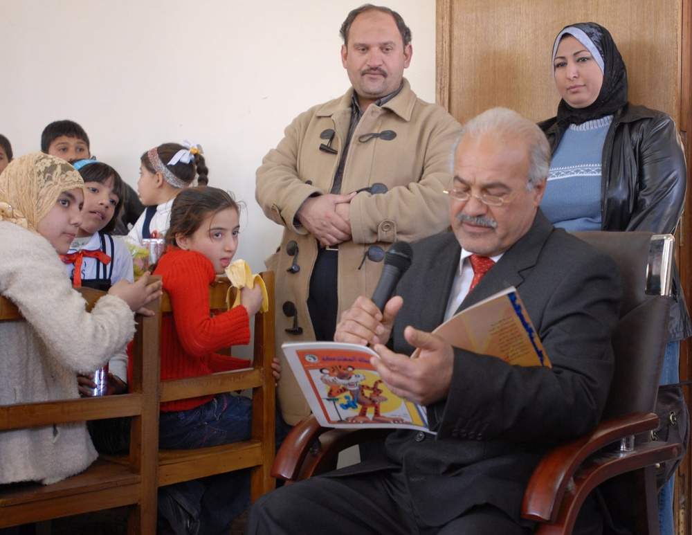 Iraqi Education Official Hosts Story Time for Doura Community Children at Reopened Library