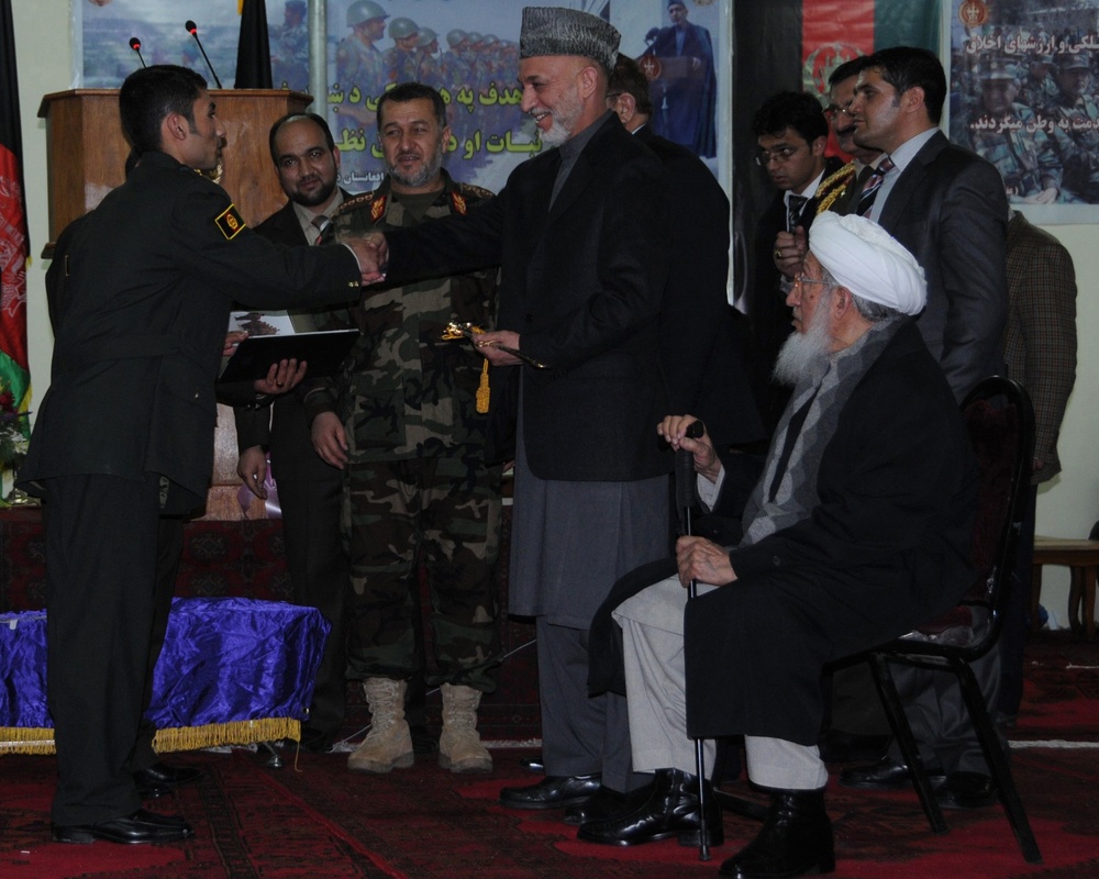 Afghan Cadet Shakes Hands with President Karzai at Military Academy Graduation