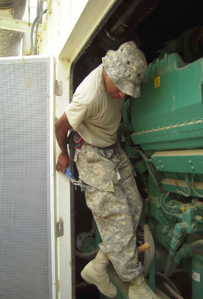 Army Sgt. Maintains Generator at Haditha Dam in Iraq