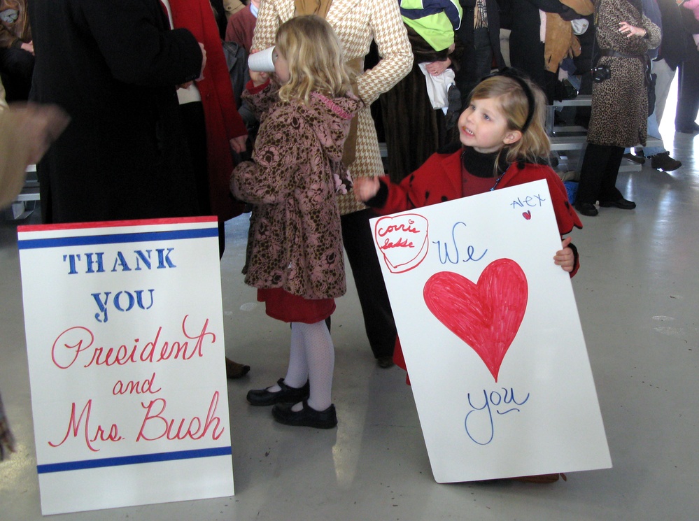 Emotional Farewell: Young Supporters Bid Adieu to Departing President Bush