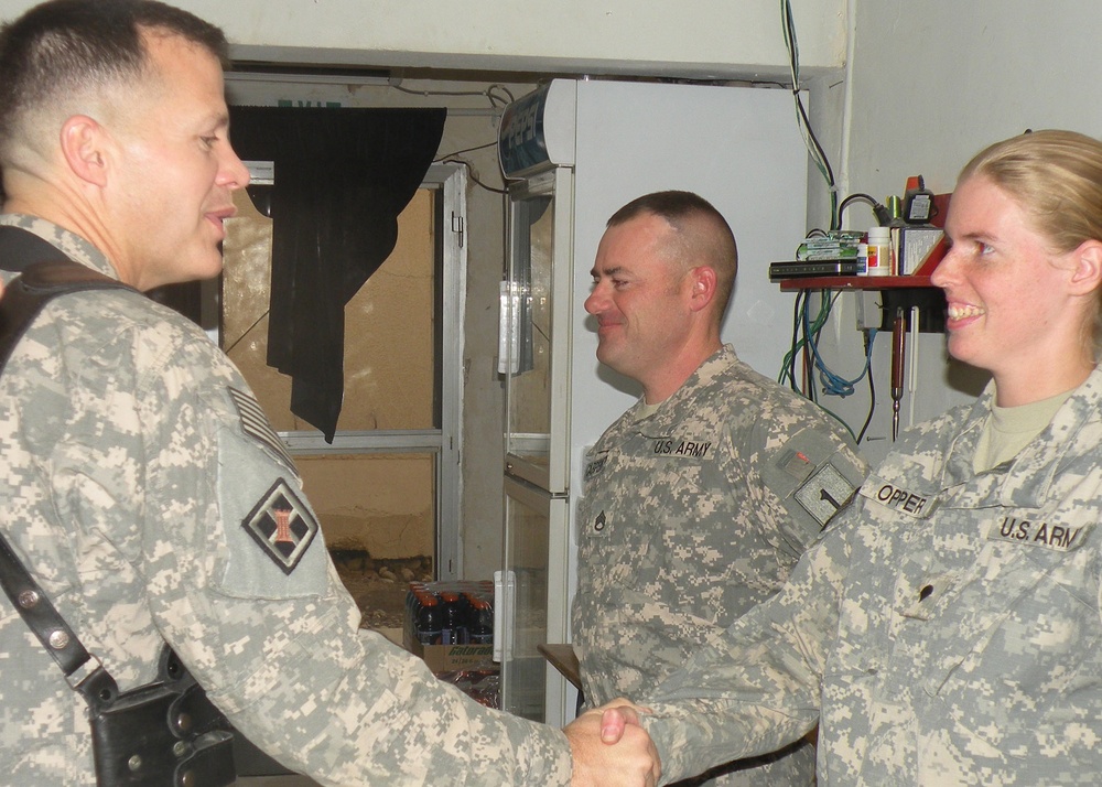 Army General Honors Soldier for Canine Care Expertise