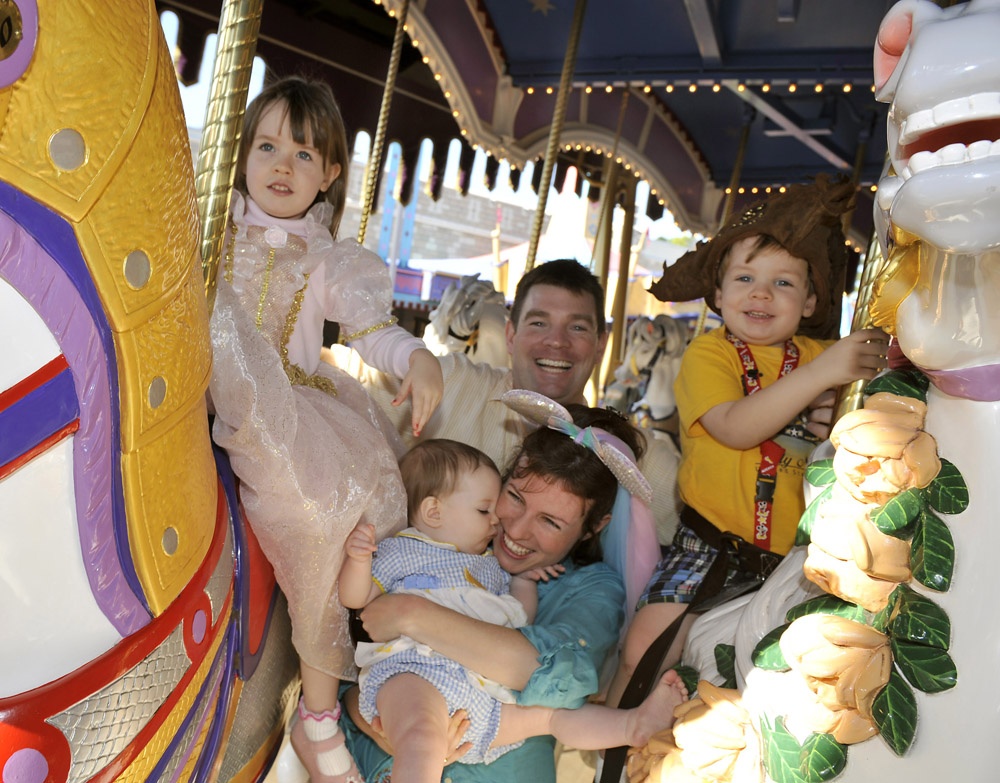Naval Officers Enjoy Family Fun at Cinderella's Golden Carrousel