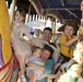 Naval Officers Enjoy Family Fun at Cinderella's Golden Carrousel