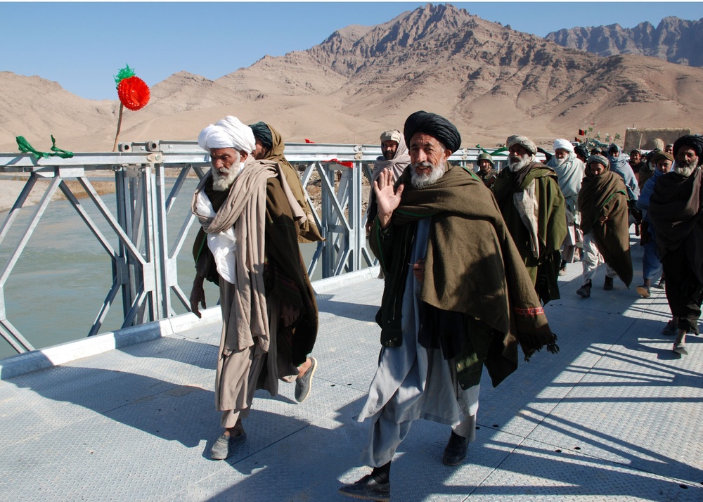 Afghan Villagers Cross Newly Opened Chutu Bridge in Uruzgon Province