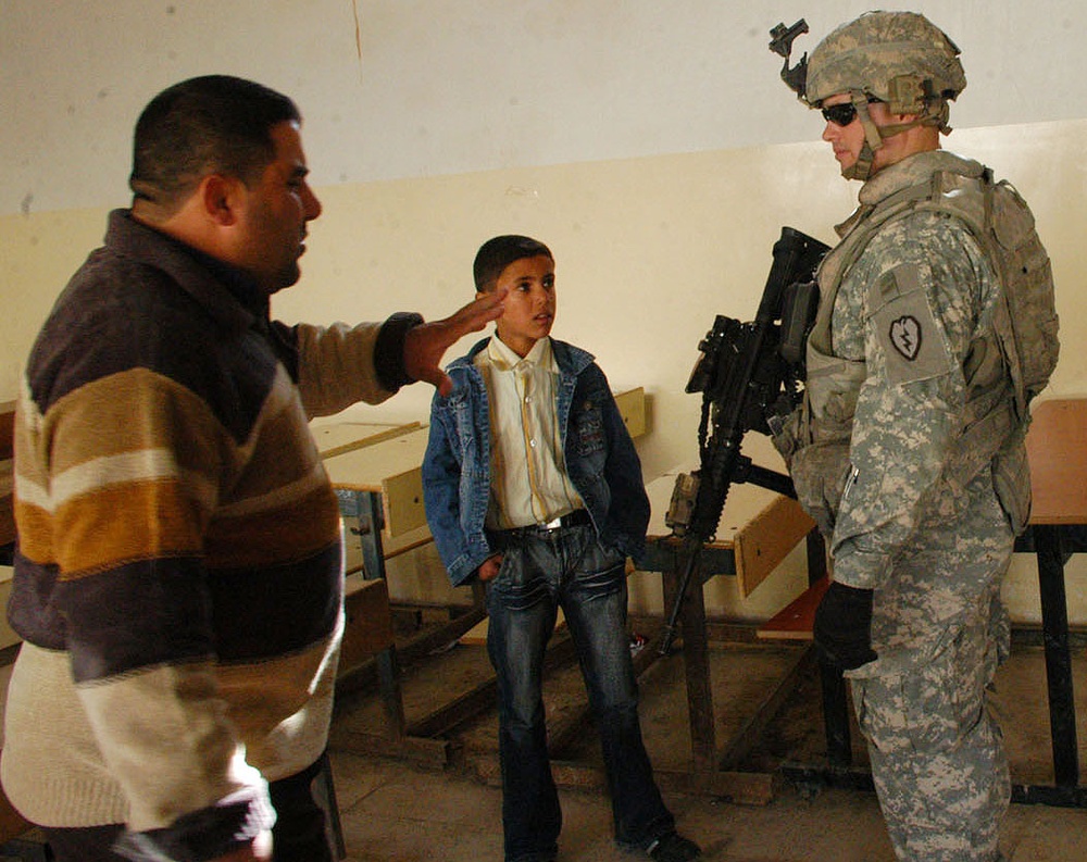 U.S. Army Captain Helps Secure Furniture for Newly Refurbished Iraqi School