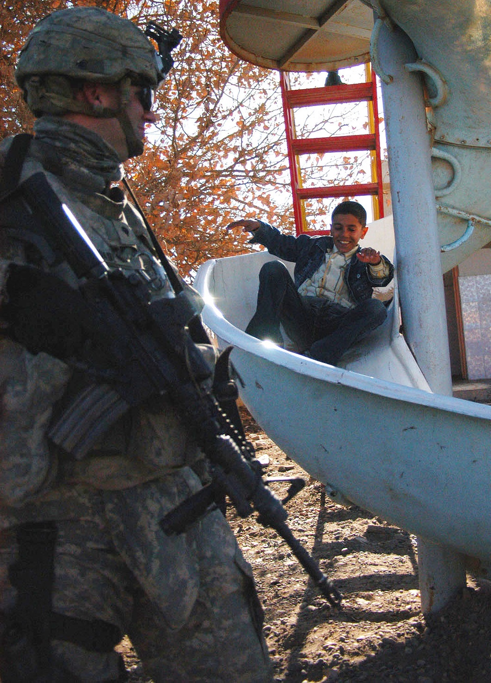 U.S. Soldier Observes Children at Newly Refurbished School in Iraq