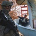U.S. Soldier Observes Children at Newly Refurbished School in Iraq