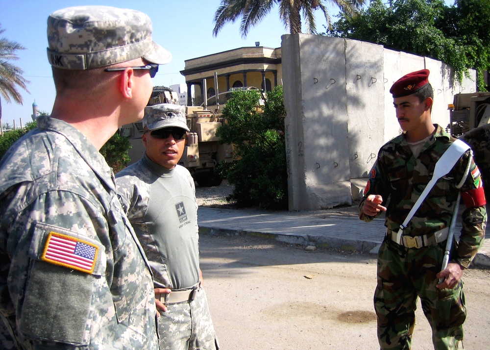 Army Interpreter Facilitates Communication Between U.S. and Iraqi Soldiers