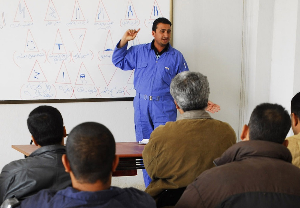 Jihad Civil Services Instructor Teaches Iraqi Street Signs in Baghdad