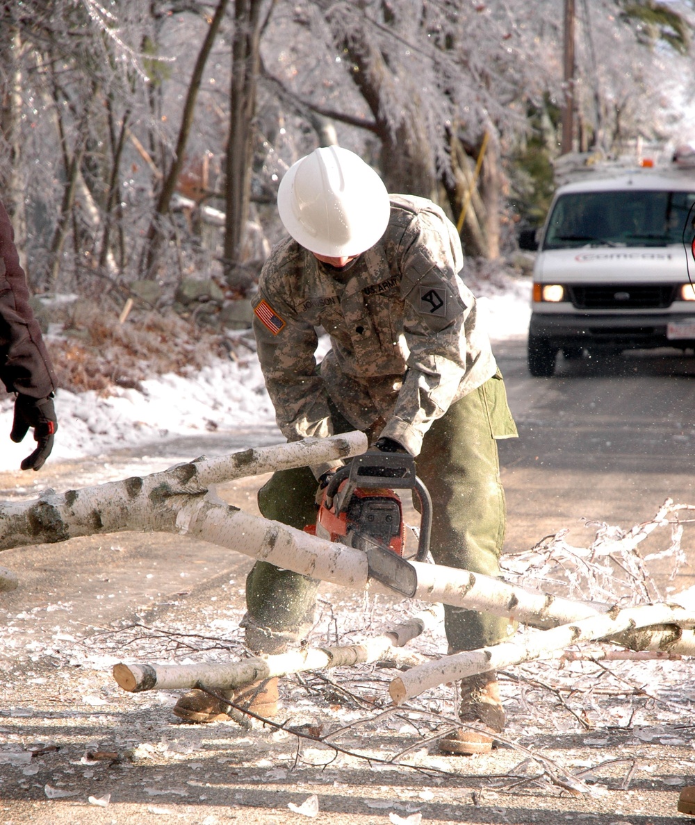 National Guard Troops Clear Fallen Trees to Restore Power After Storm