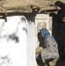 Afghan Woman Inspects Chicken Coop in Panjshir Province